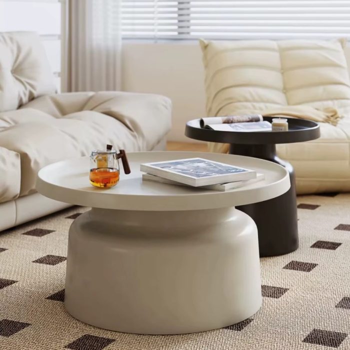 cream nordic round coffee table in living room